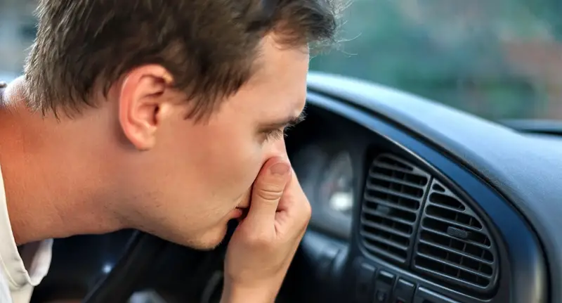 car smells like burning rubber