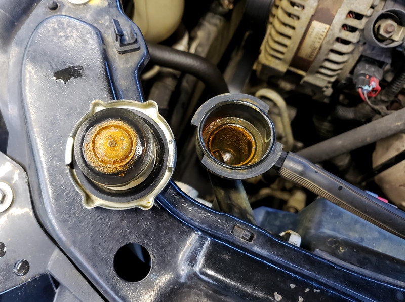 radiator fluid leaks from cap
